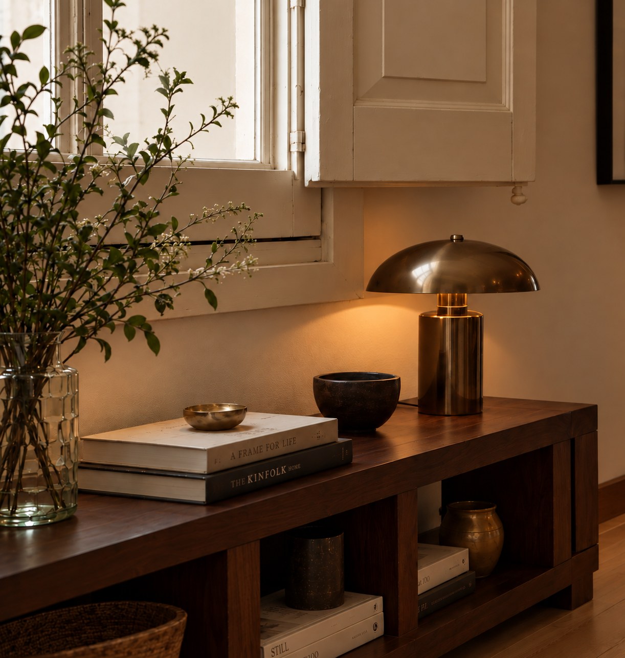 Carme — console table beneath a shuttered window